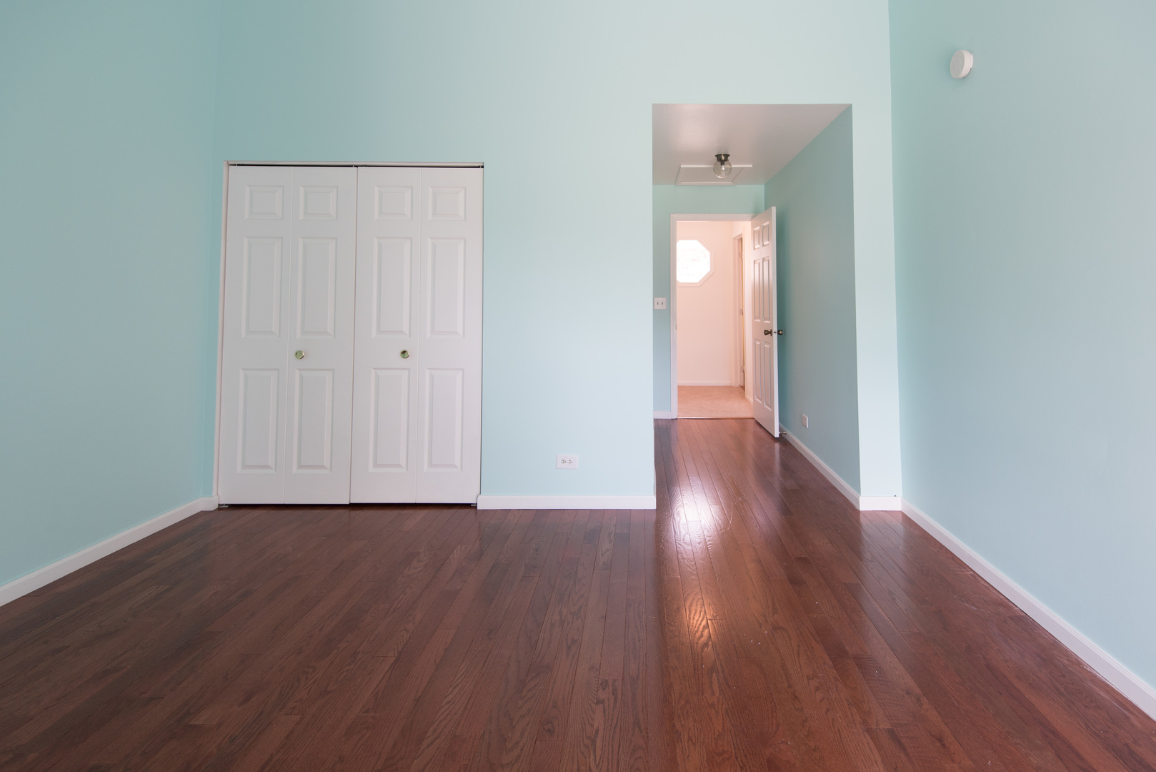 1201 Ranchview Court Buffalo Grove, IL 60089 - Photo 21 of 25 a view of a hallway with wooden floor
