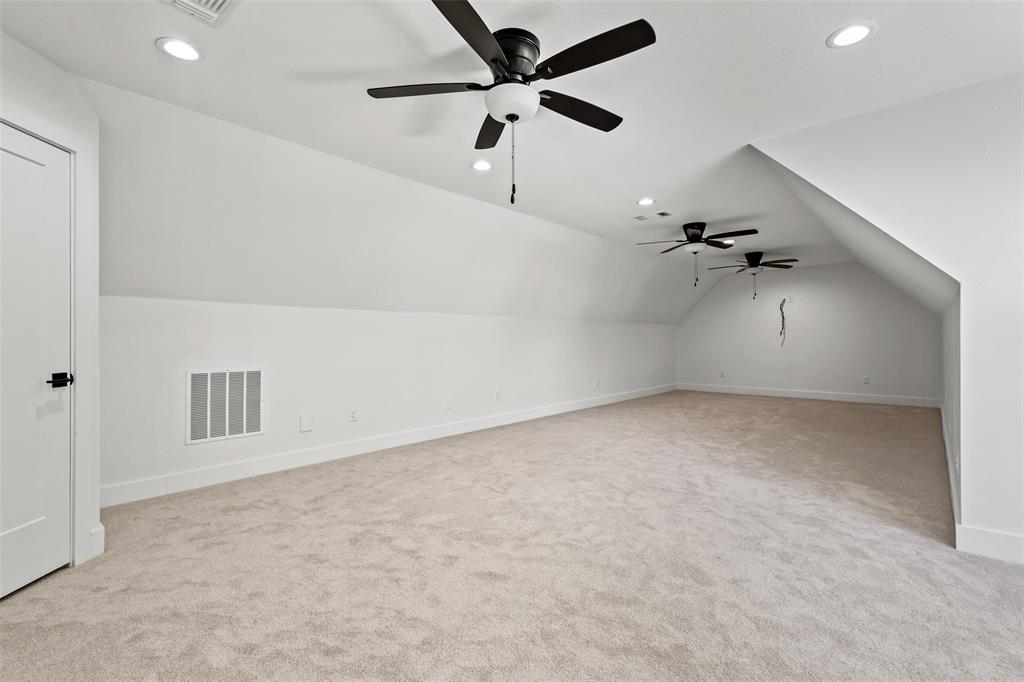 1418 Oak Hill Road Van Alstyne, TX 75495 - Photo 33 of 39 an empty room with ceiling fan and window