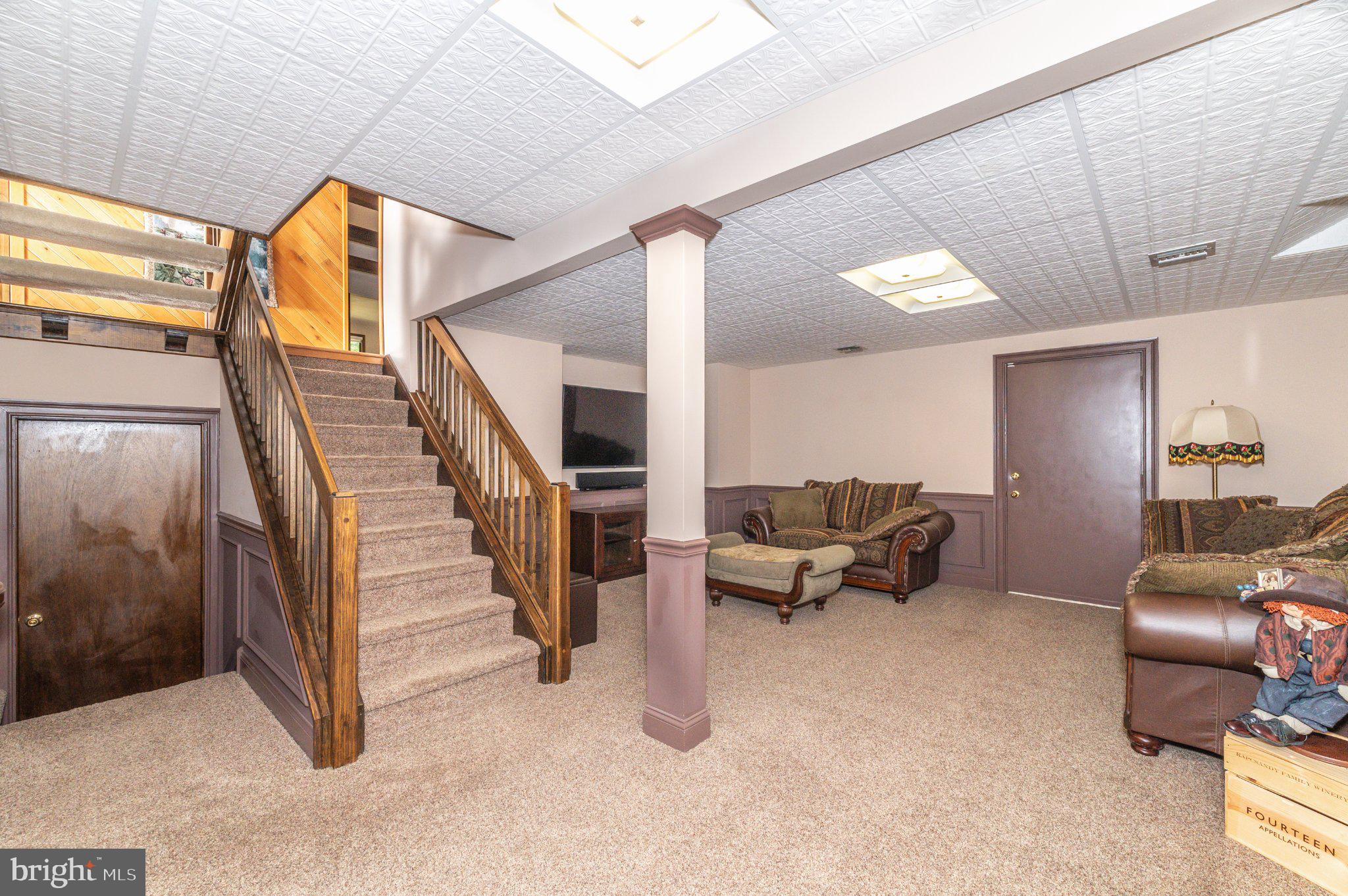 434 4th Street Atco, NJ 08004 - Photo 53 of 69 a living room with furniture and stairs
