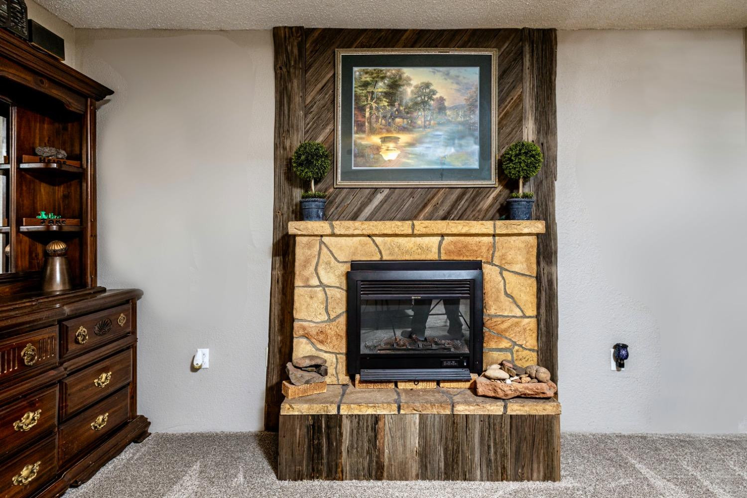 1749 Owl Road Lubbock, TX 79407 - Photo 14 of 33 Fireplace in the master bedroom