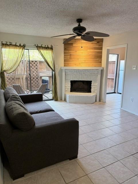 a living room with a couch and a fireplace