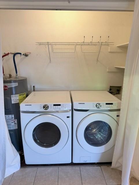 5626 Preston Oaks Road, Unit 4A Dallas, TX 75254 - Photo 12 of 15 a utility room with dryer and washer
