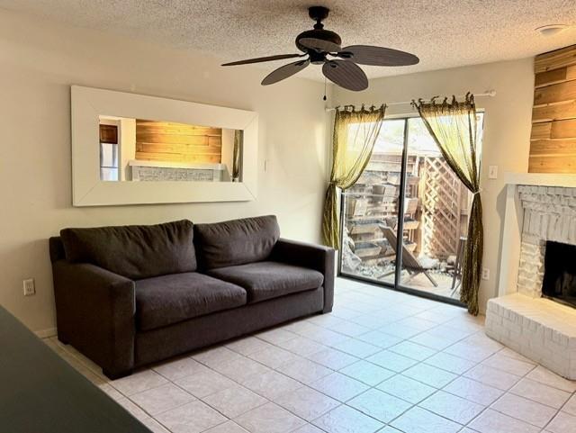 5626 Preston Oaks Road, Unit 4A Dallas, TX 75254 - Photo 2 of 15 a living room with furniture and a flat screen tv