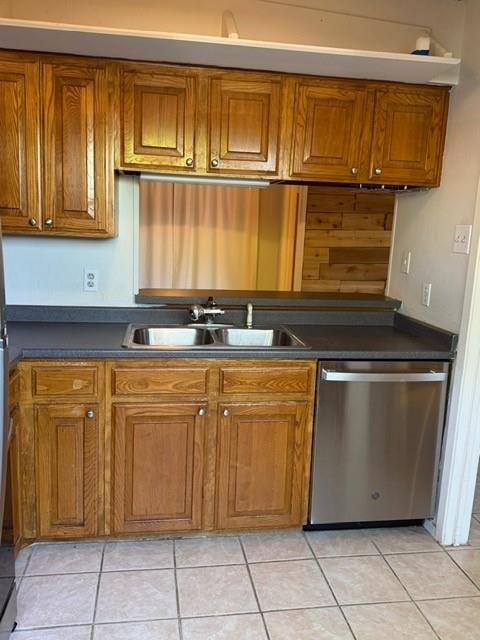 5626 Preston Oaks Road, Unit 4A Dallas, TX 75254 - Photo 9 of 15 a utility room with granite countertop a sink and a stove