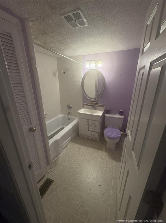 6566 Bend Of River Road Road Dunn, NC 28334 - Photo 13 of 20 a bathroom with a sink a toilet a mirror and a tub