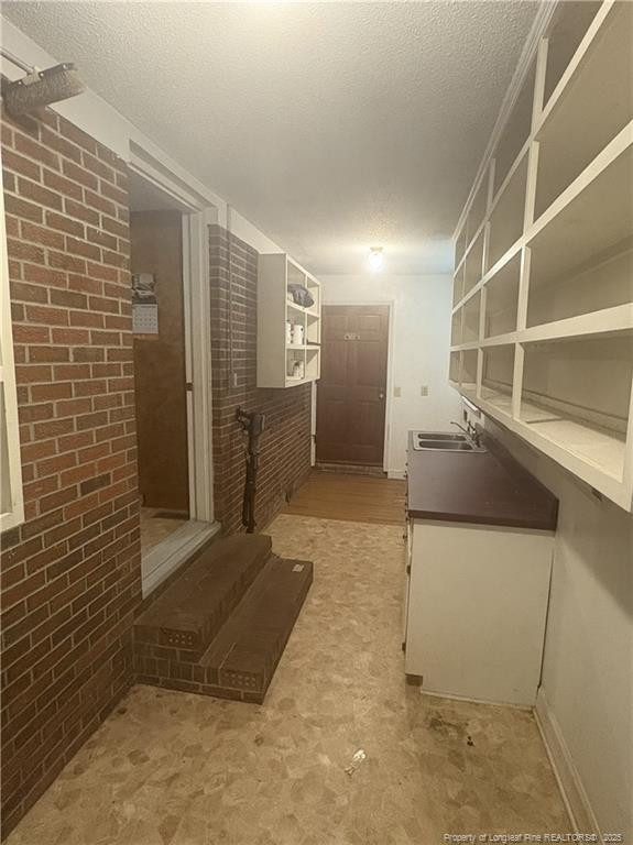 6566 Bend Of River Road Road Dunn, NC 28334 - Photo 15 of 20 a view of a hallway with wooden walls