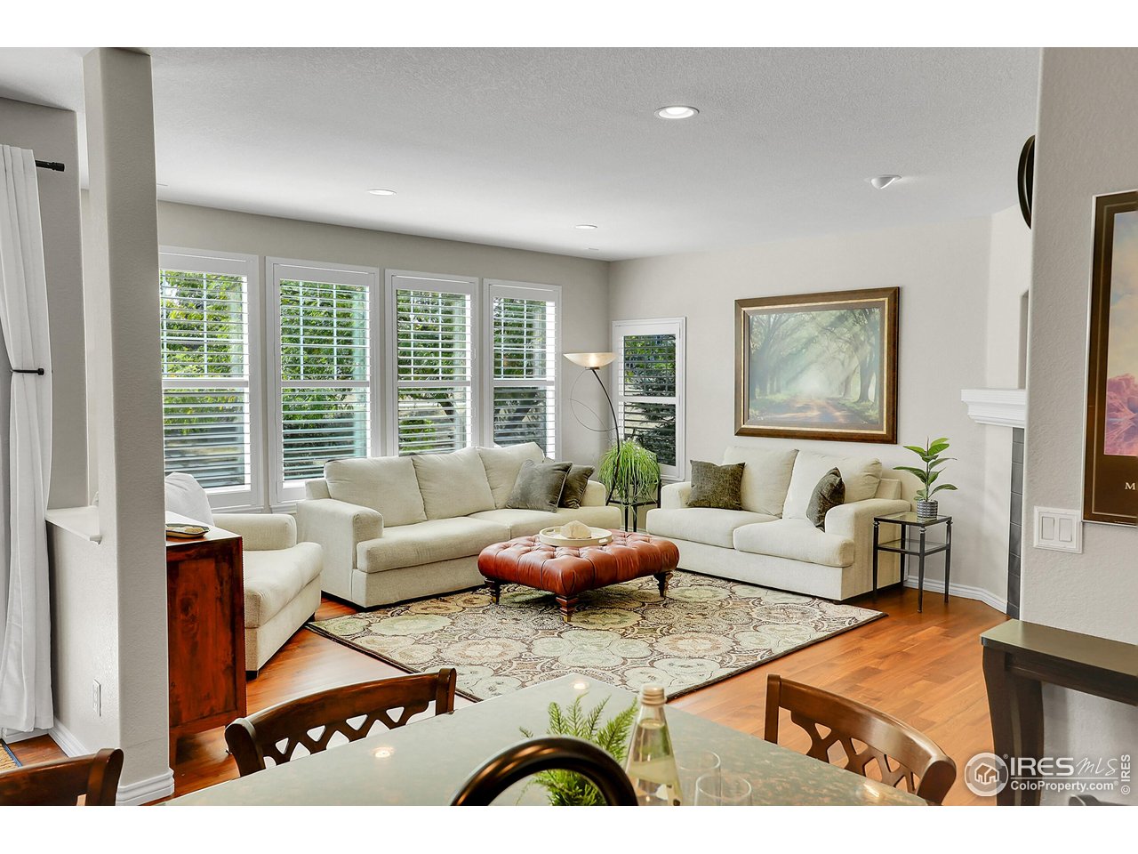 112 Austin Avenue Erie, CO 80516 - Photo 14 of 44 a living room with furniture and a large window