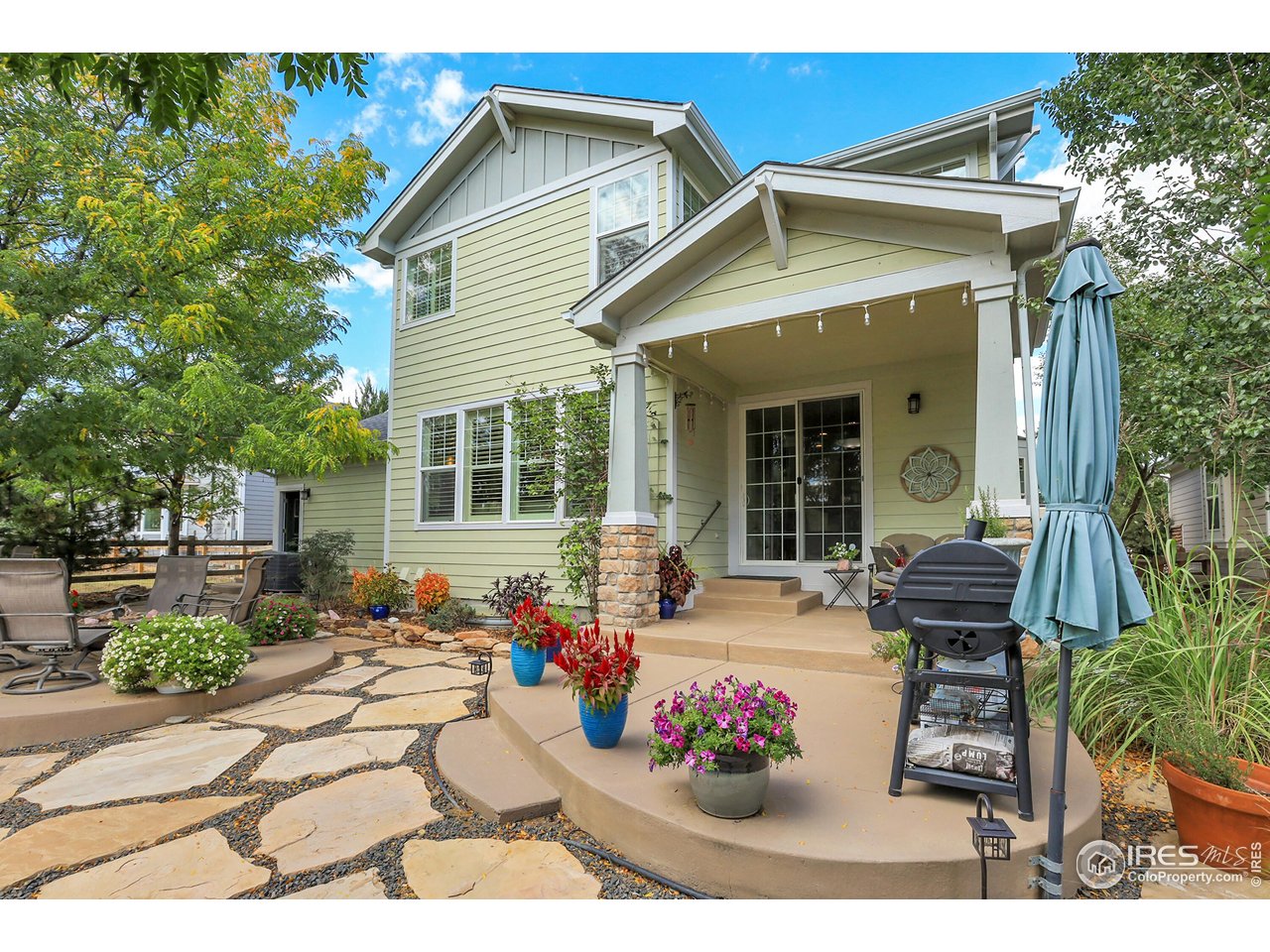 112 Austin Avenue Erie, CO 80516 - Photo 17 of 44 a front view of a house with outdoor seating