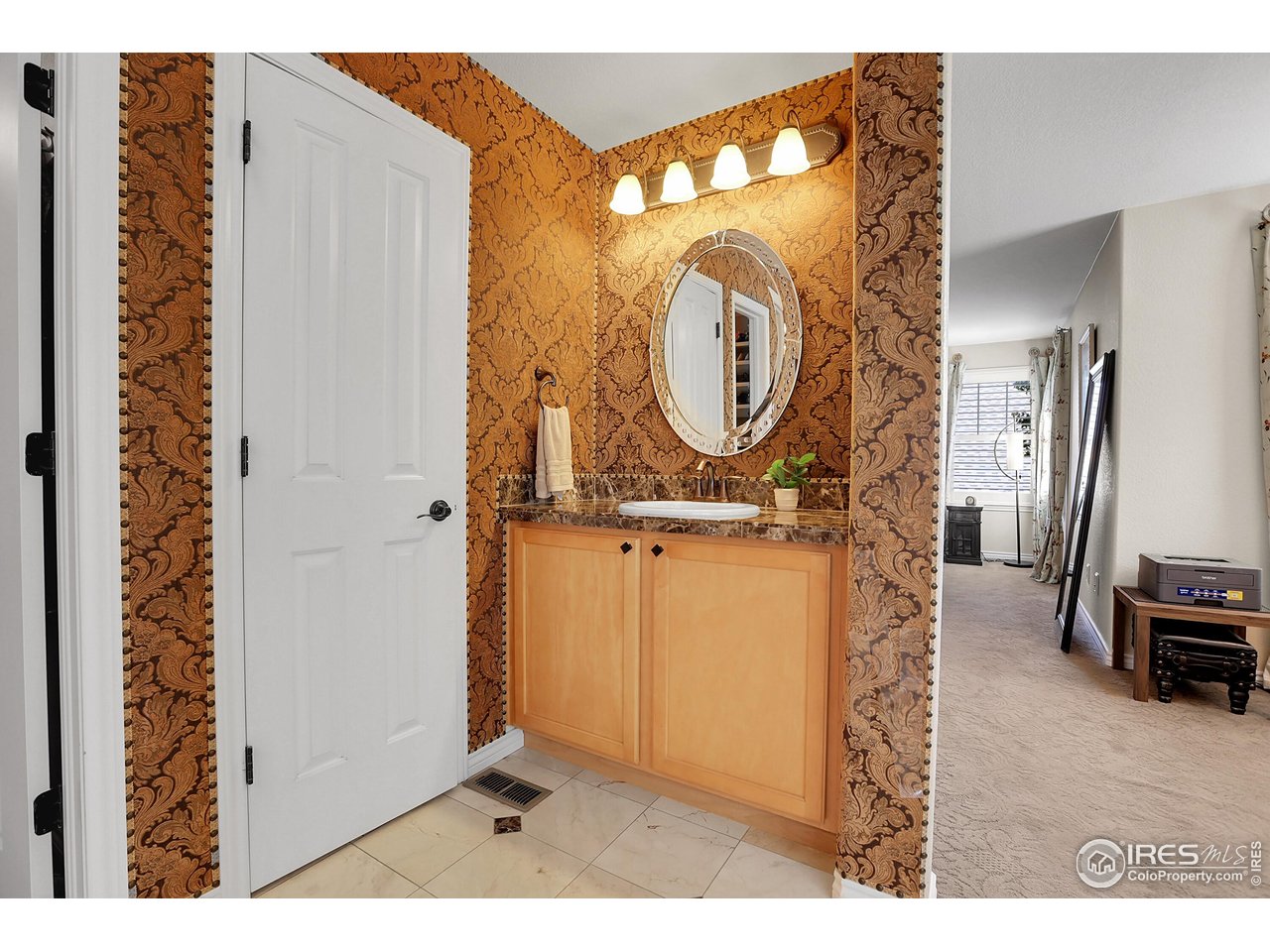 112 Austin Avenue Erie, CO 80516 - Photo 30 of 44 a view of a entryway door with wooden floor