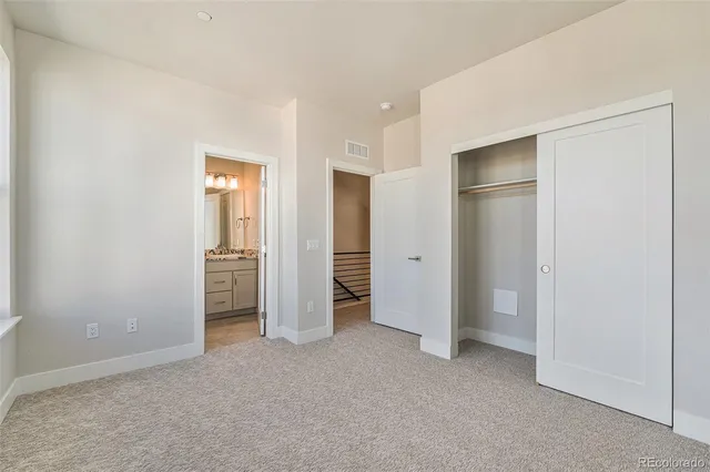 a view of an empty walk in closet