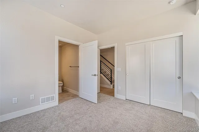 a view of a balcony with a potted plant
