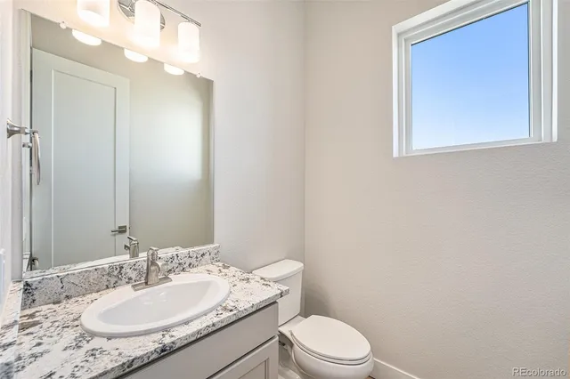 a front view of a building with many windows