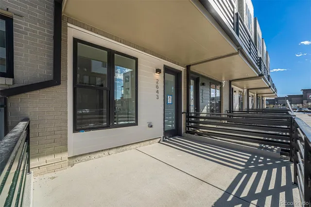 a front view of a building with glass windows