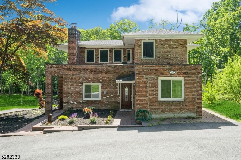 242 Lake Road Morristown, NJ 07960 - Photo 15 of 47 a view of house with outdoor space and porch