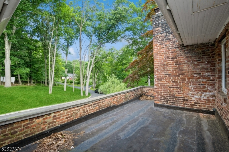 242 Lake Road Morristown, NJ 07960 - Photo 37 of 47 a view of a back yard from a balcony