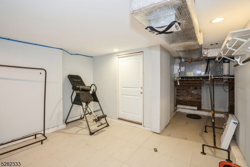 242 Lake Road Morristown, NJ 07960 - Photo 43 of 47 a view of a room with gym equipment