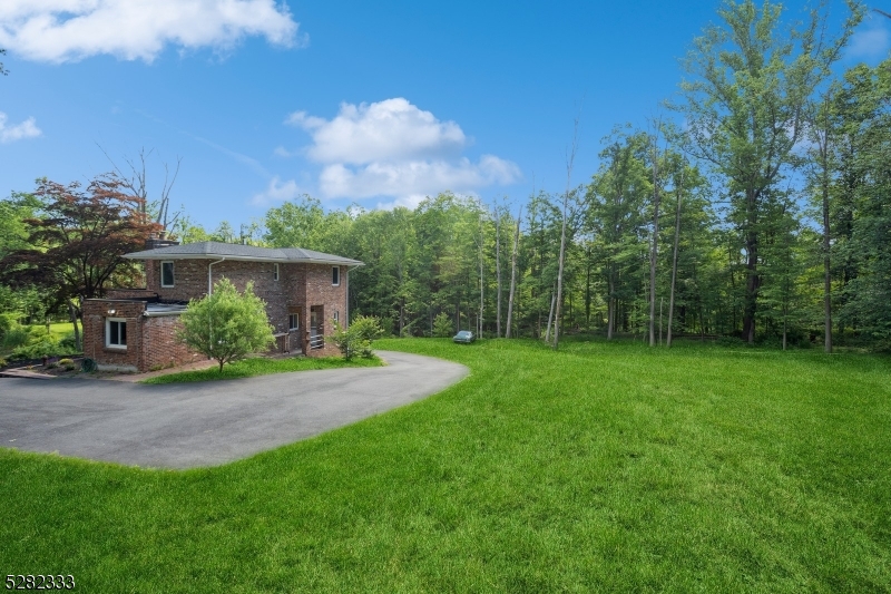 242 Lake Road Morristown, NJ 07960 - Photo 47 of 47 a view of a house with backyard and garden