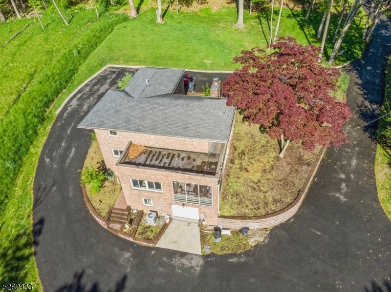 242 Lake Road Morristown, NJ 07960 - Photo 9 of 47 a view of a swimming pool with a yard