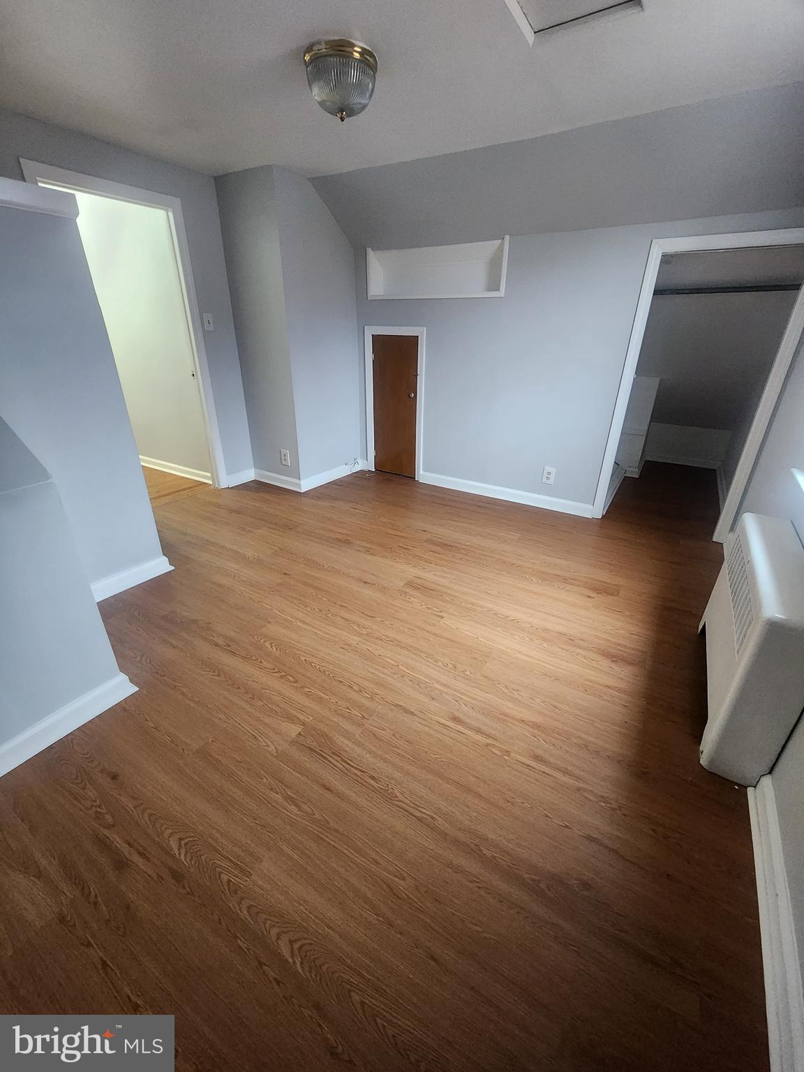 17 Malan Avenue Berlin, NJ 08009 - Photo 8 of 10 en empty room with wooden floor and fan