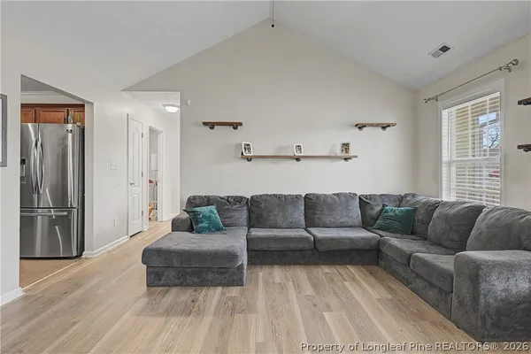 a living room with furniture and a couch