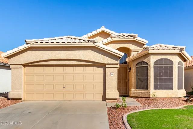 a view of a house with a garage