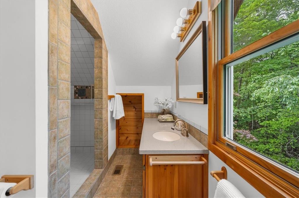 470 Sautee Ridge Road Clarkesville, GA 30523 - Photo 21 of 37 a bathroom with a sink and a mirror