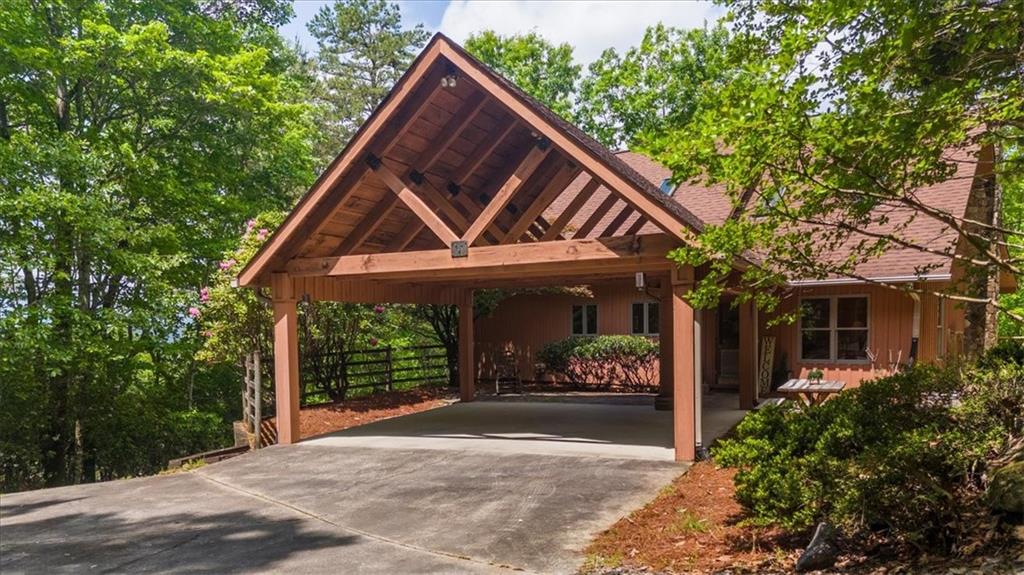 470 Sautee Ridge Road Clarkesville, GA 30523 - Photo 32 of 37 a front view of a house with a garden