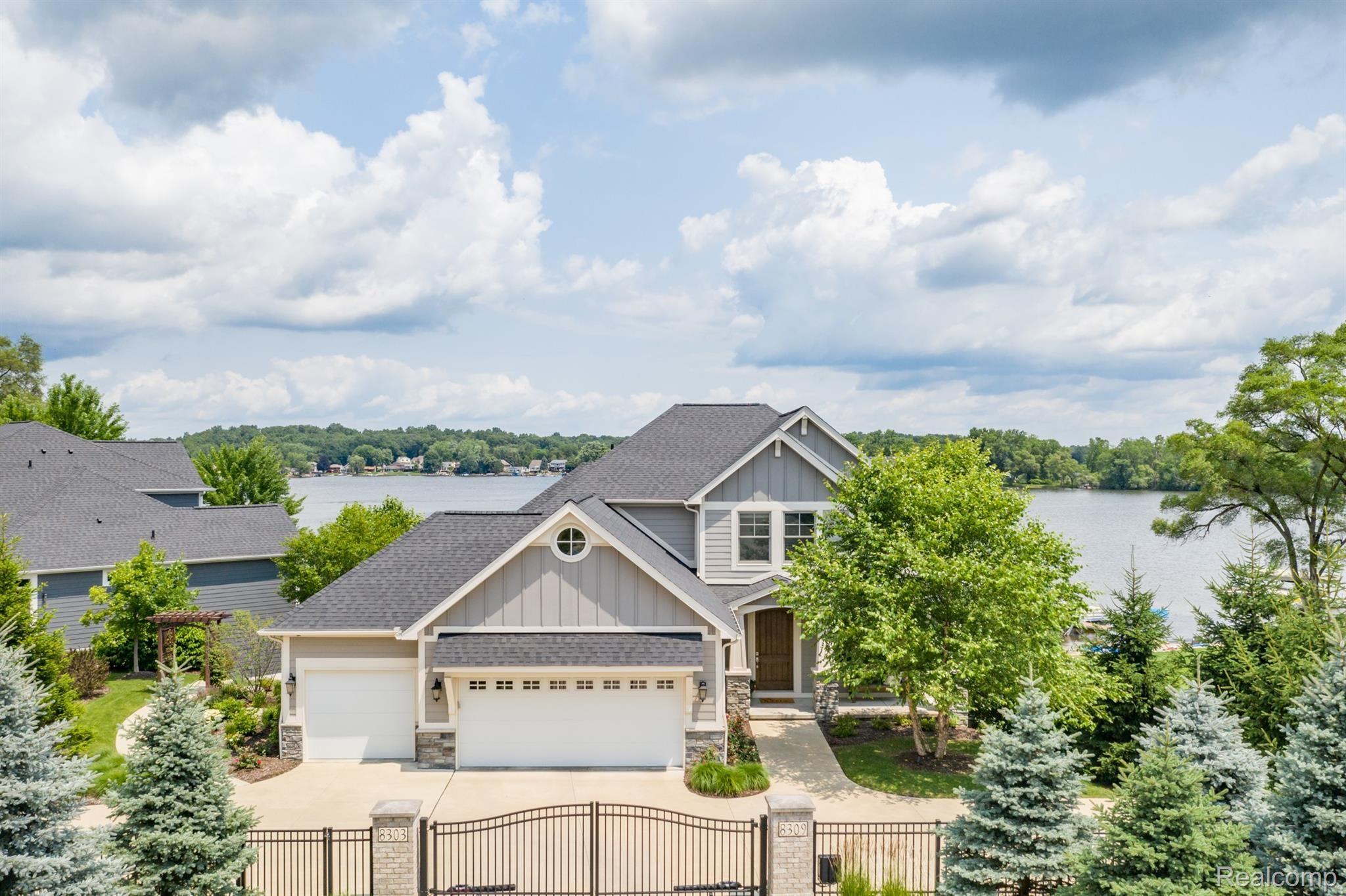 8309 Hilton Road Brighton, MI 48114 - Photo 1 of 56 Gated entrance to your waterfront home