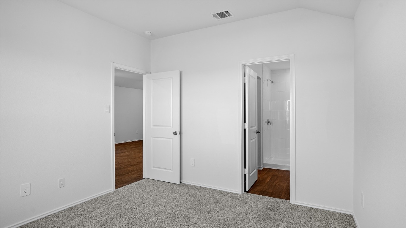 105 Celosia Loop Kyle, TX 78640 - Photo 13 of 14 an empty room with closet