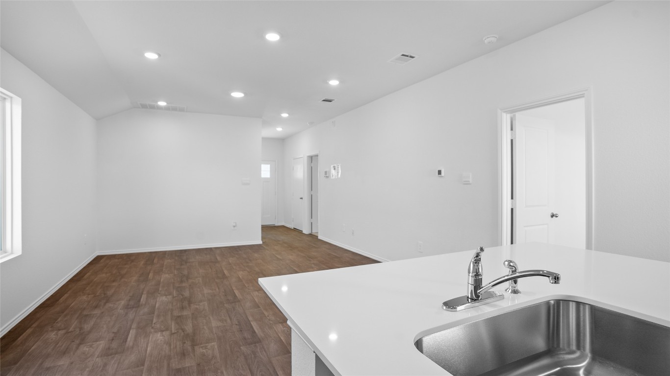 105 Celosia Loop Kyle, TX 78640 - Photo 9 of 14 a bathroom with a sink and a mirror