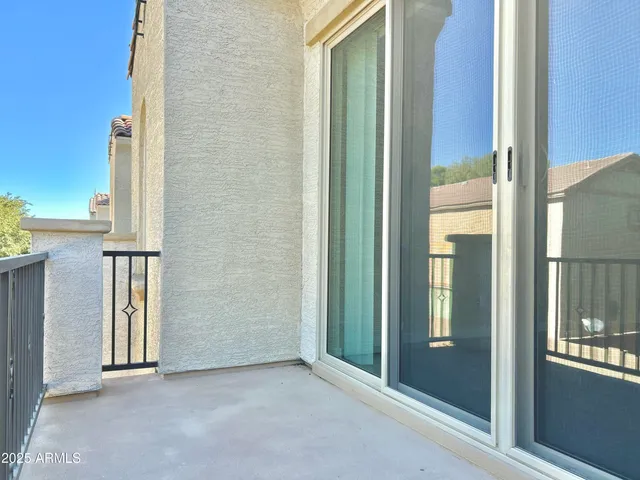 a view of front door with yard
