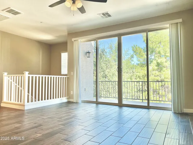 a view of an empty room and window
