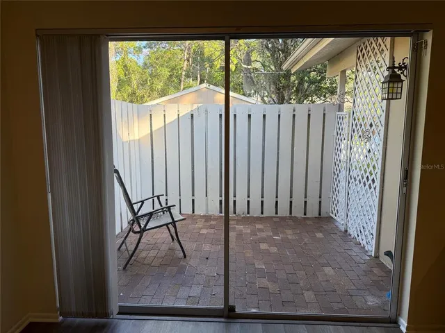 a view of a porch with a door