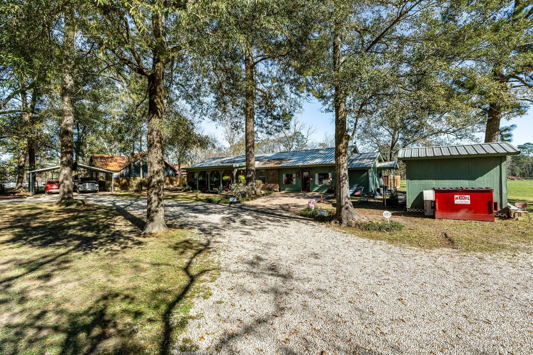 15091 Farm To Market 1485 Conroe, TX 77306 - Photo 5 of 28 a view of outdoor space with seating area