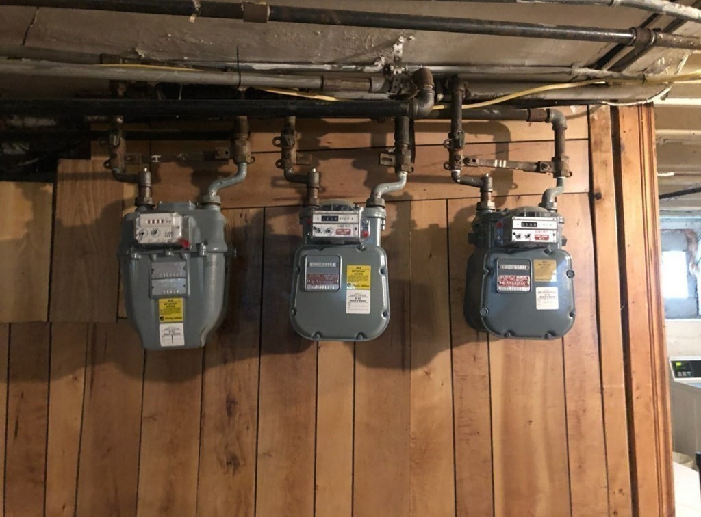 219 William Street Fall River, MA 02721 - Photo 11 of 14 a close view of water heater room