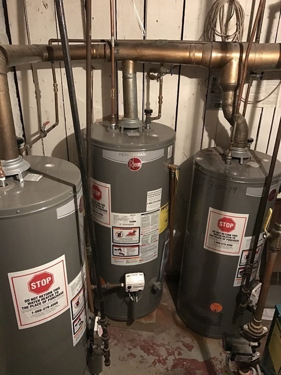 219 William Street Fall River, MA 02721 - Photo 13 of 14 a room with storage and utility