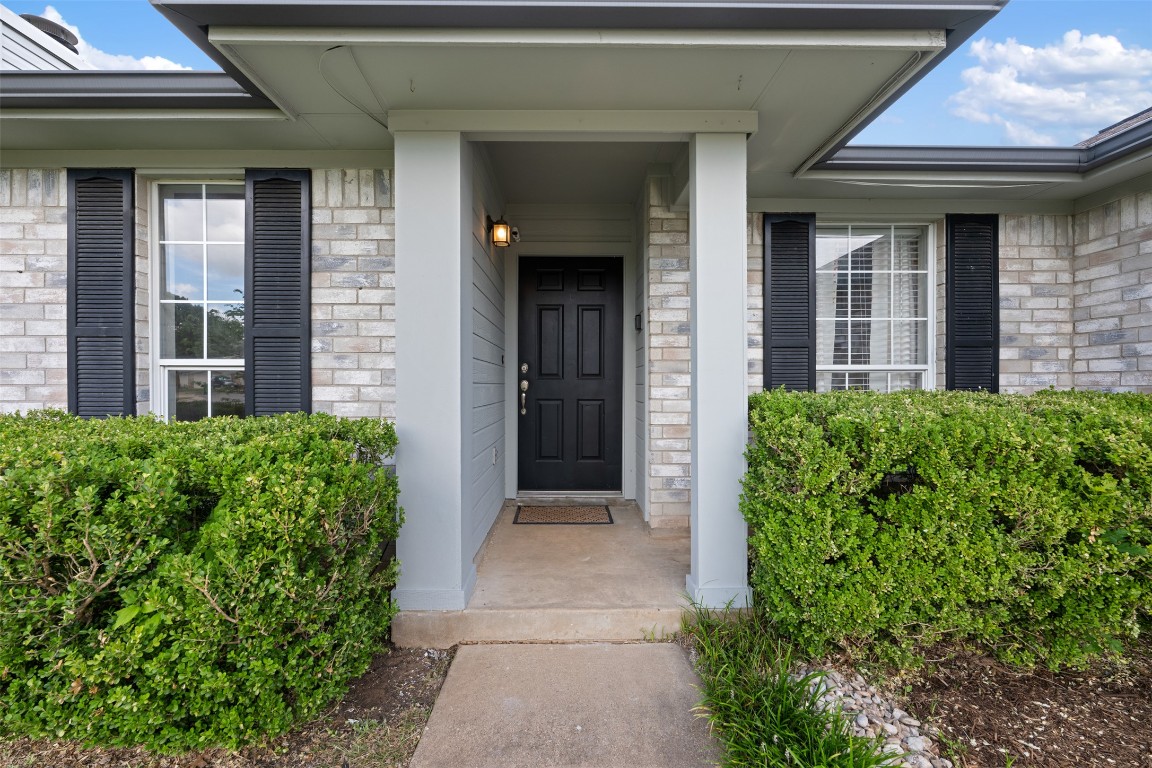 2004 Yaupon Trail Cedar Park, TX 78613 - Photo 2 of 33 a view of a house with potted plants