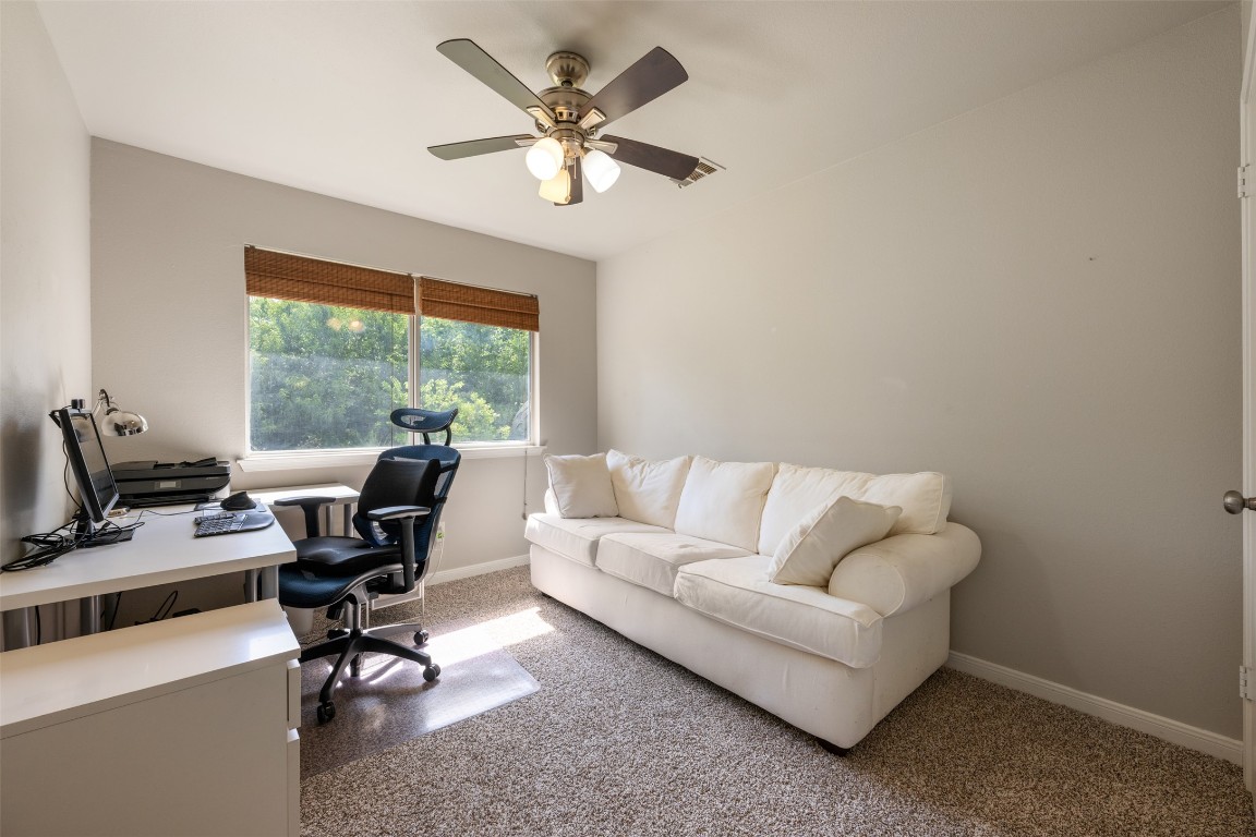 2004 Yaupon Trail Cedar Park, TX 78613 - Photo 22 of 33 a living room with furniture and a window
