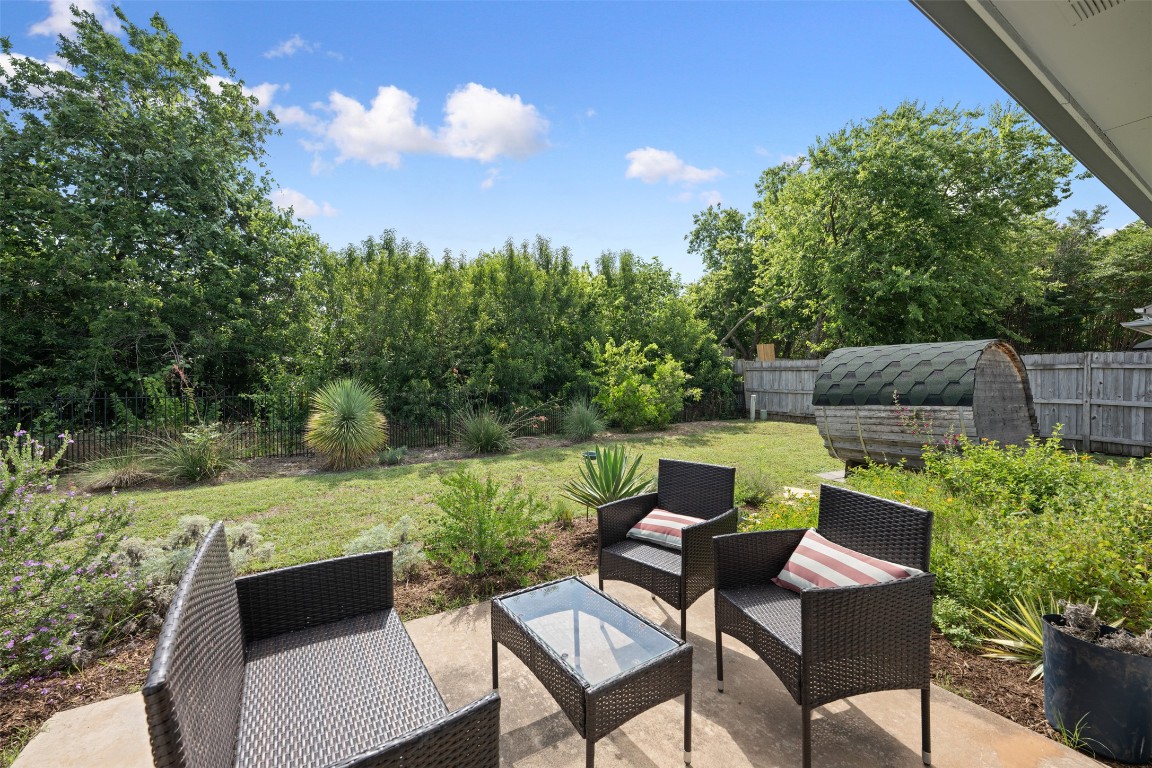 2004 Yaupon Trail Cedar Park, TX 78613 - Photo 25 of 33 a view of backyard of house with seating area