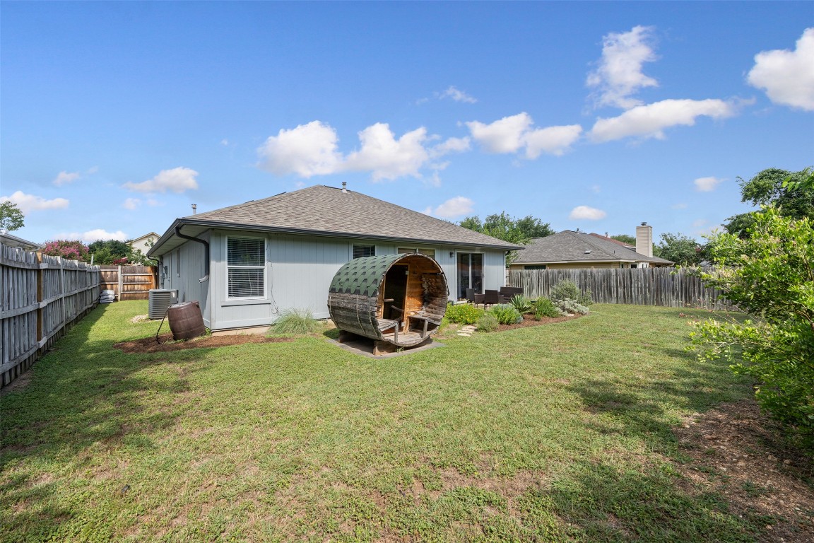 2004 Yaupon Trail Cedar Park, TX 78613 - Photo 30 of 33 a view of a house with backyard