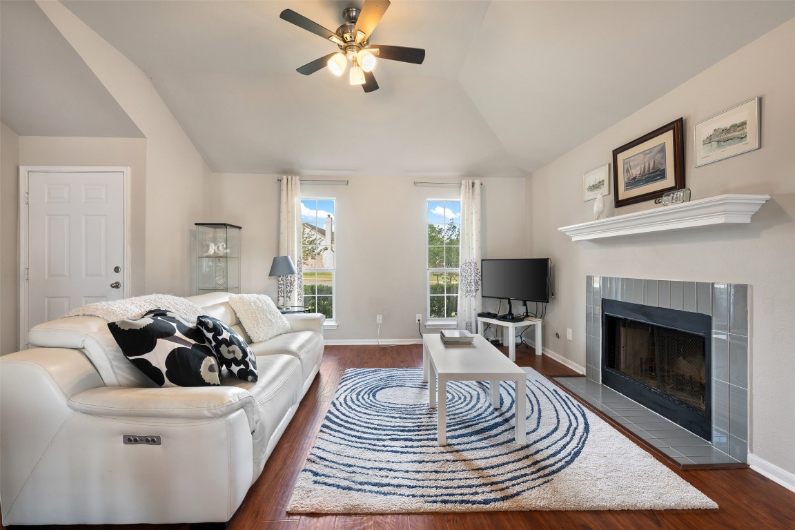 2004 Yaupon Trail Cedar Park, TX 78613 - Photo 5 of 33 a living room with furniture and a fireplace
