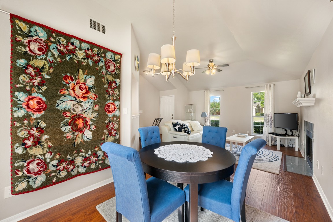 2004 Yaupon Trail Cedar Park, TX 78613 - Photo 10 of 33 a view of a dining room with furniture and wooden floor