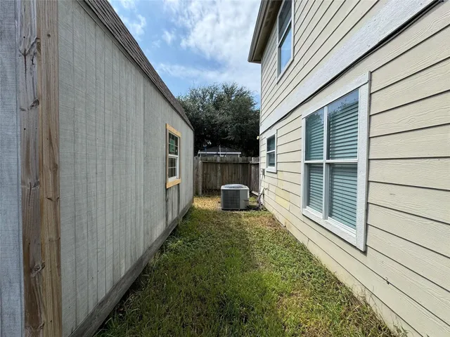 a house view with a backyard space