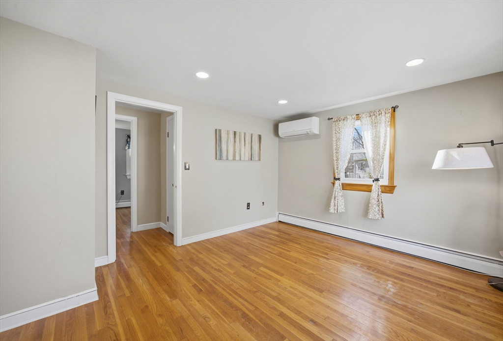 55 Maynard Road Dedham, MA 02026 - Photo 12 of 38 a view of empty room with wooden floor