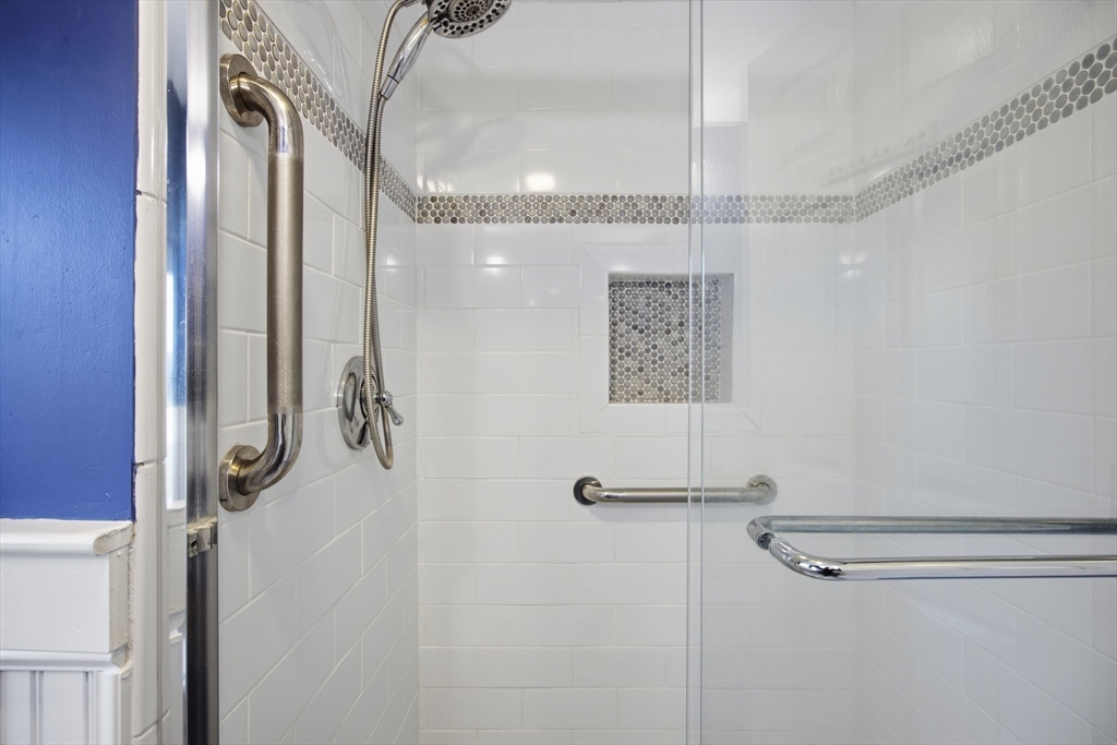 55 Maynard Road Dedham, MA 02026 - Photo 25 of 38 a bathroom with a shower