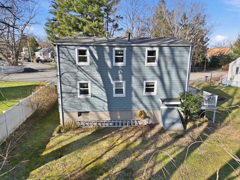 55 Maynard Road Dedham, MA 02026 - Photo 28 of 38 front view of a house with a yard