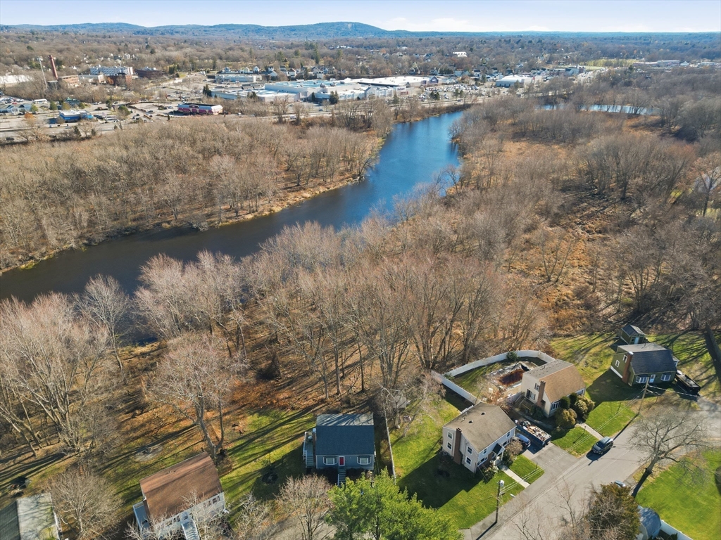 55 Maynard Road Dedham, MA 02026 - Photo 32 of 38 an aerial view of residential building with outdoor space and lake view