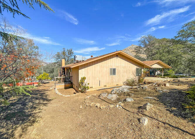 41000 Oak Ridge Drive Three Rivers, CA 93271 - Photo 36 of 39 a view of a house with a yard