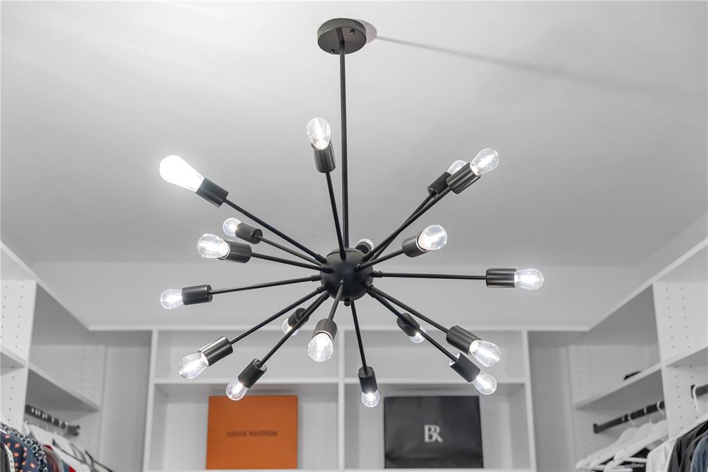 239 East Harding Street Orlando, FL 32806 - Photo 37 of 60 a view of a hallway with furniture and chandelier