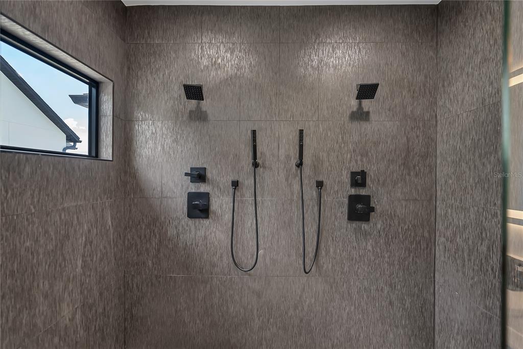 239 East Harding Street Orlando, FL 32806 - Photo 40 of 60 a bathroom with a shower